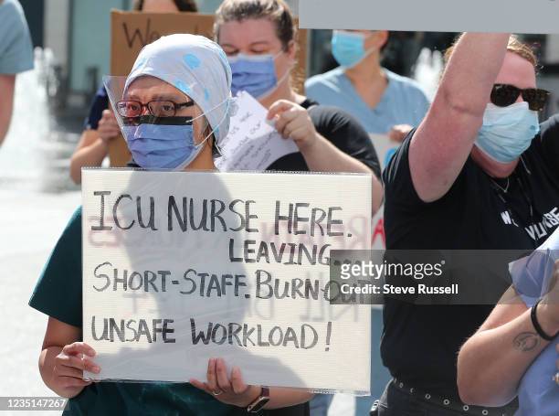 Toronto, ON- September 9 - Nurses rally at Yonge-Dundas Square to protest Bill 124, wage-suppression legislation that negatively impacts registered...