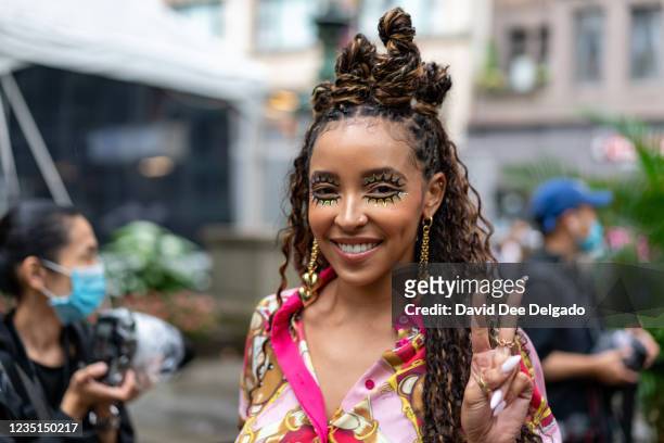 Singer Tinashe is seen leaving the Moschino by Jeremy Scott Spring Summer 2022 fashion show during New York Fashion Week at Bryant Park on September...