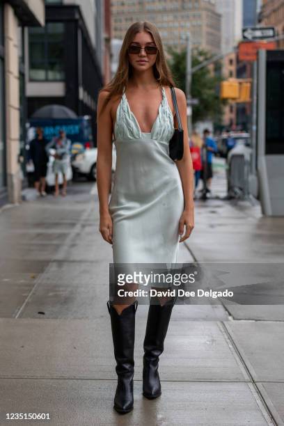 Jessie Andrews is seen wearing a dress by Bevza while departing the Bevza Spring Summer 2022 fashion show at Spring Studios during New York Fashion...