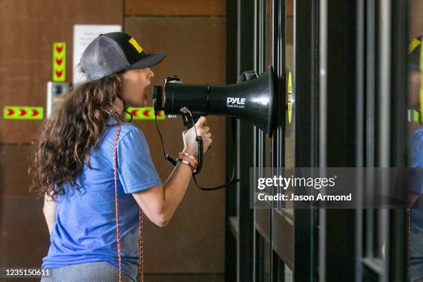 Demonstrators opposed to masking and mandatory vaccination for students gather outside the Los Angeles Unified School District headquarters as board...