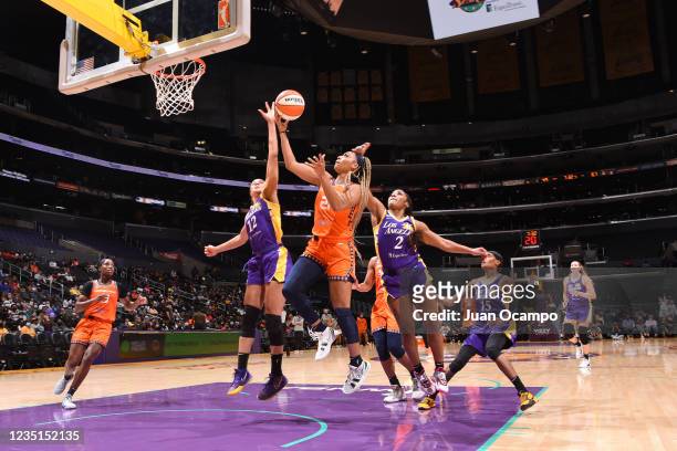 DiJonai Carrington of the Connecticut Sun drives to the basket against the Los Angeles Sparks on September 9, 2021 at the Staples Center in Los...