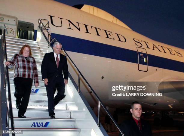 Defense Secretary Robert Gates and his wife Becky arrive at Haneda International Airport in Tokyo for an overnight visit to Japan on January 12,...