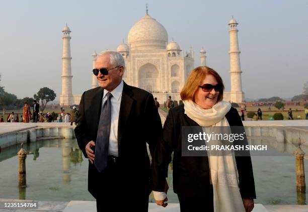 Defense Secretary Robert Gates poses with his wife Becky in front of the Taj Mahal in Agra on January 20, 2010. The Al-Qaeda network poses a serious...