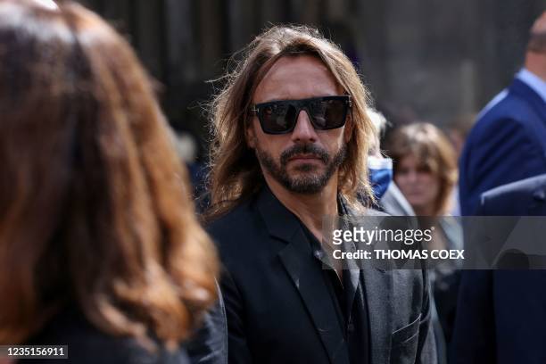 French producer and house music DJ Christophe Le Friant, known as Bob Sinclar leaves after the funeral ceremony for late French actor Jean-Paul...