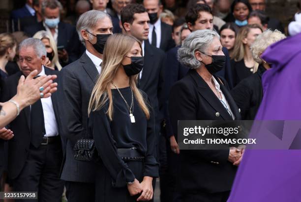 Jean-Paul Belmondo's son Paul Belmondo , daughter Stella Belmondo and daughter Florence Belmondo look on after the funeral ceremony for late French...