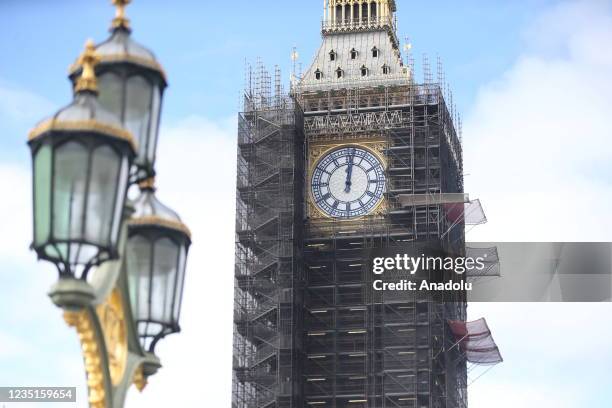 Photo shows the restored clock face on Elizabeth Tower, displaying the original Prussian blue color of the hands, on September 10, 2021 in London,...