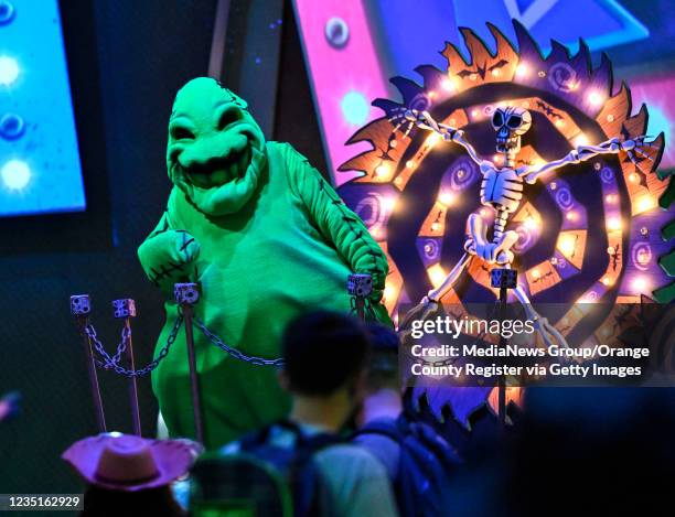 Anaheim, CA Oogie Boogie, the main antagonist in The Nightmare Before Christmas, greets visitors during Oogie Boogie Bash, A Disney Halloween Party,...