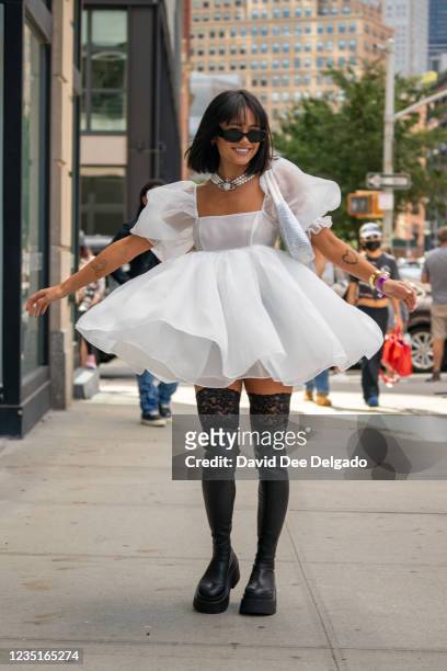 Summer Rachel Warren is seen wearing a dress by Selkie, boots by Naked Wolfe and a Prada hand bag at Spring Studios during New York Fashion Week on...