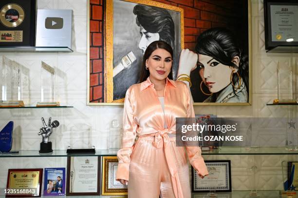 Afghan pop star Aryana Sayeed poses during an interview in Istanbul on September 8, 2021. - Afghan pop star Aryana Sayeed recalls asking her fiance...