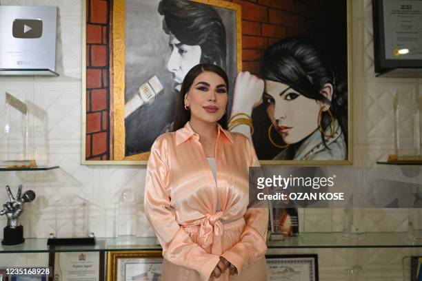 Afghan pop star Aryana Sayeed poses during an interview in Istanbul on September 8, 2021. - Afghan pop star Aryana Sayeed recalls asking her fiance...