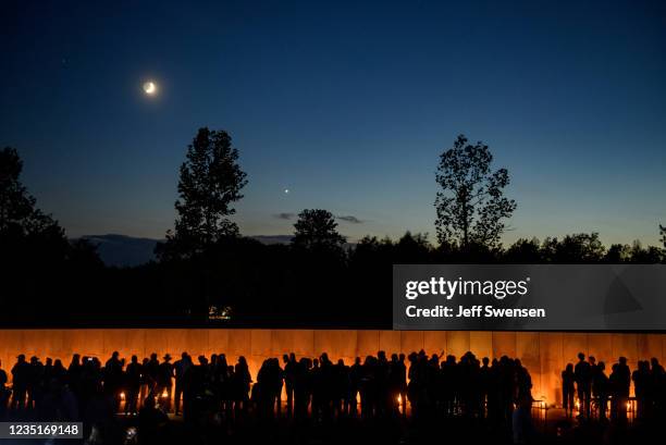 Visitors along the Wall of Names at the Flight 93 National Monument during the Luminaria Ceremony on September 10, 2021 in Shanksville, Pennsylvania....