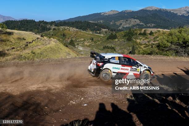 Finland's Niki Halttunen and his co-driver Jonne Halttunen compete with their Toyota Yaris RC1 WRC during the Acropolis Rally in the special stage of...