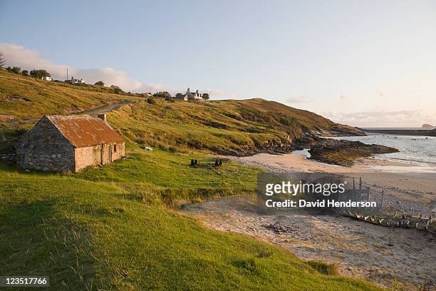 cottage and wreck, talmine, scotland - beach cottage bildbanksfoton och bilder
