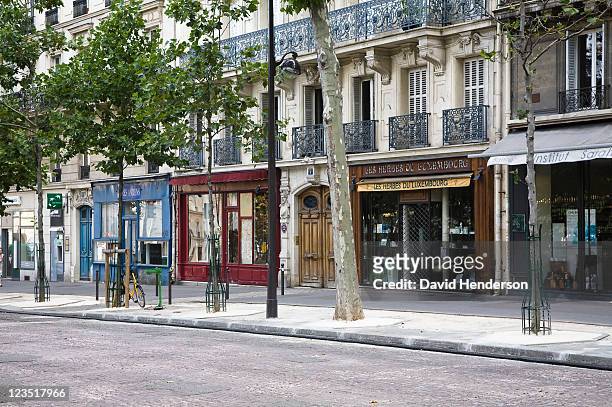 rue des medicis, paris, france - façade de magasin photos et images de collection