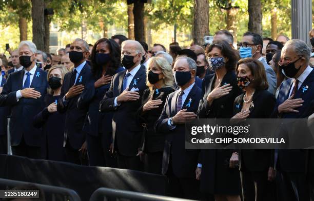 Former President Bill Clinton, former First Lady Hillary Clinton, former President Barack Obama, former First Lady Michelle Obama, President Joe...