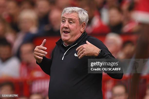 Newcastle United's English head coach Steve Bruce gestures on the touchline during the English Premier League football match between Manchester...