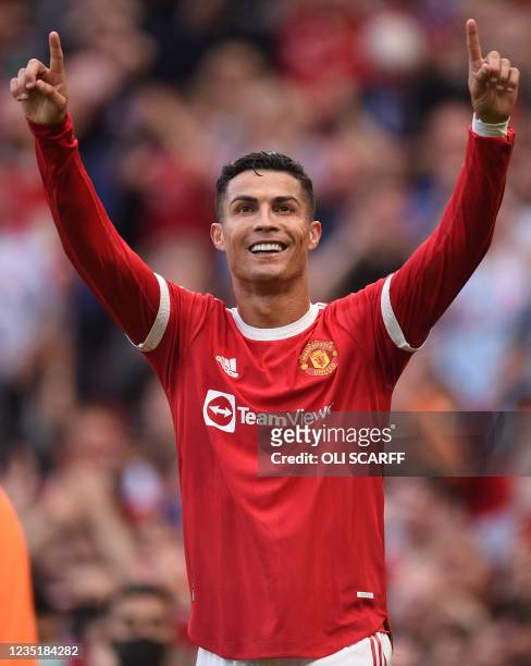 Manchester United's Portuguese striker Cristiano Ronaldo celebrates after scoring their second goal during the English Premier League football match...