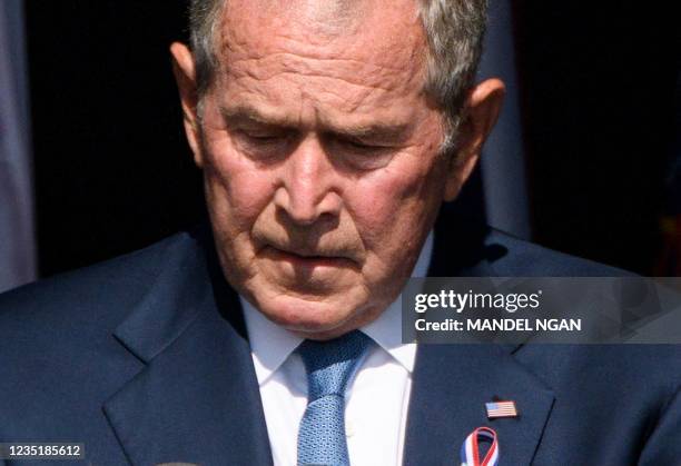 Former US President George W. Bush pauses as he speaks during a 9/11 commemoration at the Flight 93 National Memorial in Shanksville, Pennsylvania on...