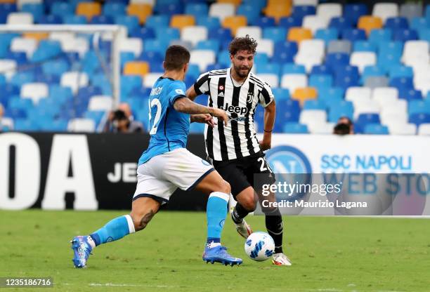 Manuel Locatelli of Juventus competes for the ball with Giovanni Di Lorenzo of Napoli during the Serie A match between SSC Napoli and Juventus at...