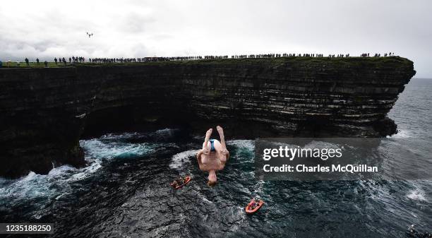 Andy Jones of USA dives from the cliffs edge at Downpatrick Head on September 11, 2021 in Mayo, Ireland. The Red Bull Cliff Diving World Series...