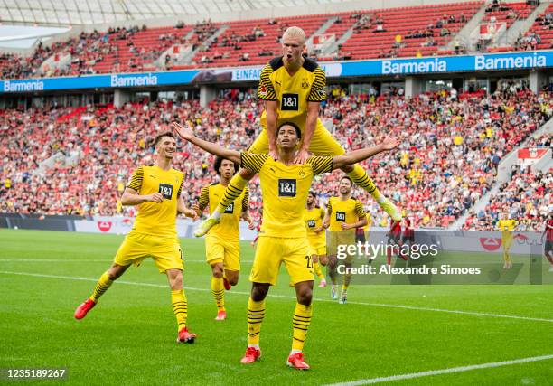 Jude Bellingham and Erling Haaland during the Bundesliga match between Bayer 04 Leverkusen and Borussia Dortmund at BayArena on September 11, 2021 in...