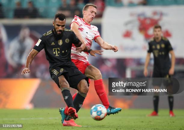 Bayern Munich's Cameroonian forward Eric Maxim Choupo-Moting scores the 1-4 past Leipzig's German defender Lukas Klostermann during the German first...