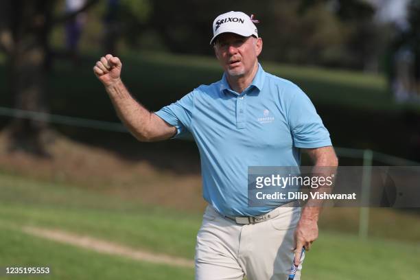 Rod Pampling of Australia celebrates after sinking his putt on the 17th hole during the second round of the Ascension Charity Classic on September...