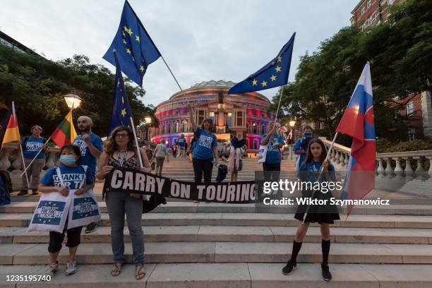 Pro-EU activists, musicians and touring artists wave flags of EU and its member states outside Royal Albert Hall ahead of the Last Night of the Proms...