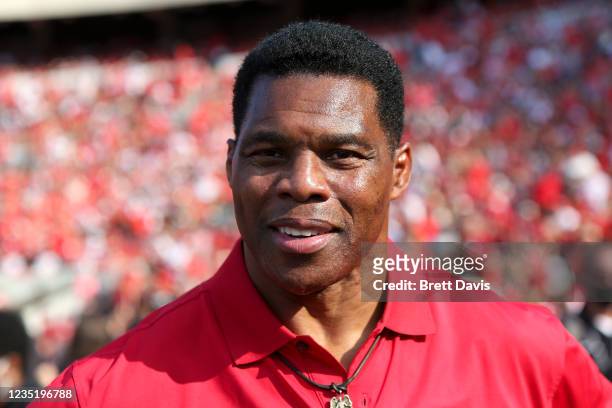 Former running back Herschel Walker for the Georgia Bulldogs on the sidelines against the UAB Blazers in the first half at Sanford Stadium on...