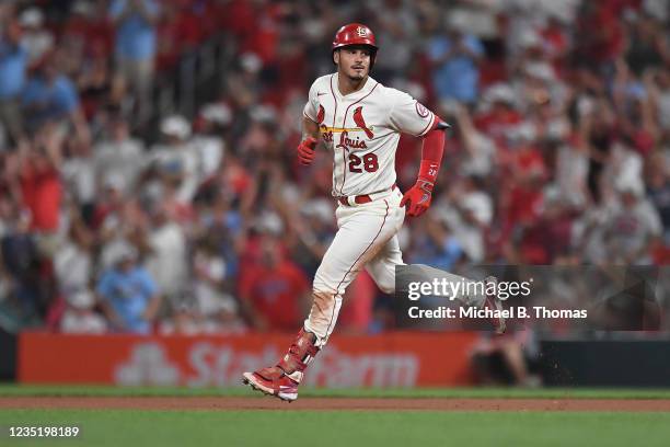 Nolan Arenado of the St. Louis Cardinals rounds the bases after hitting a two-run home run in the eighth inning against the Cincinnati Reds at Busch...