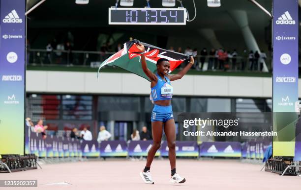Brenda Jepleting of Kenya celebrates after winning the ADIZERO: ROAD TO RECORDS Womens Only Half Marathon in a personal best time of 1:06:52 at...