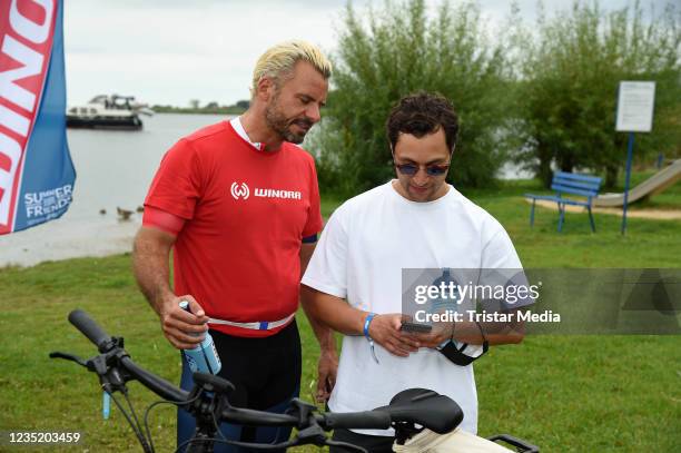 Stephan Luca and Ludwig Trepte during an e-bike cycling tour as part of the event "Summer For Friends" in aid of Welthungerhilfe on September 11,...