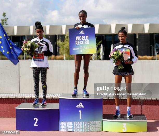 Senbere Teferi of Ethiopia on the podium after breaking the Womens Only 5km World Record by 15s after winning in a time of 14m:29s in the ADIZERO:...