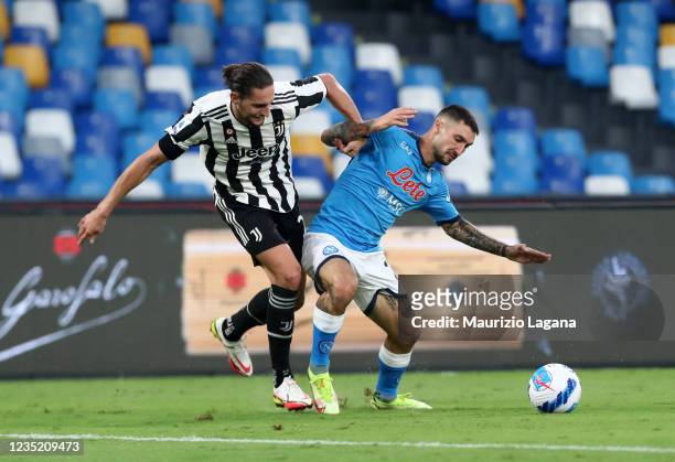 Adrien Rabiot of Juventus competes for the ball with Matteo Politano of Napoli during the Serie A match between SSC Napoli and Juventus at Stadio...