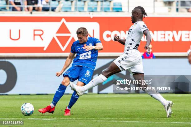 Gent's Alessio Castro Montes and Charleroi's Mamadou Fall fight for the ball during a soccer match between KAA Gent and Sporting Charleroi, Sunday 12...