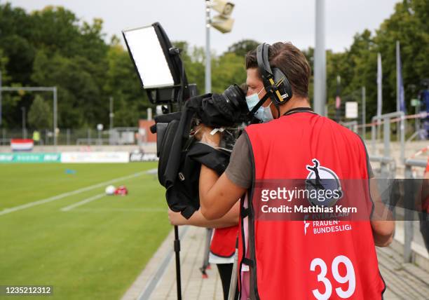 Camera man is pictured during the FLYERALARM Frauen-Bundesliga match between Eintracht Frankfurt and 1. FC Koeln at Stadion am Brentanobad on...