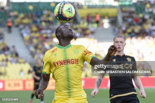 Nantes' French forward Osman Bukari heads the ball during the French L1 football match between FC Nantes and OGC Nice at Stade de la Beaujoire in...