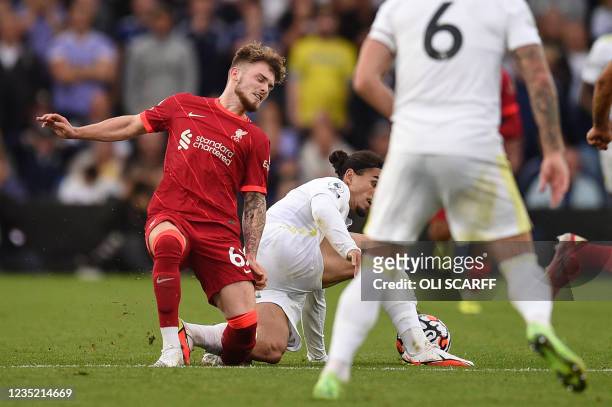 Liverpool's English striker Harvey Elliott suffers a serious leg injury during a tackle by Leeds United's Dutch defender Pascal Struijk during the...
