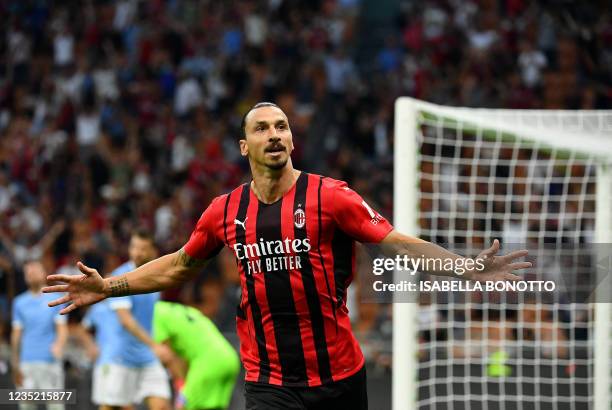 Milans Swedish forward Zlatan Ibrahimovic celebrates after scoring during the Italian Serie A football match between AC Milan and Lazio at The San...