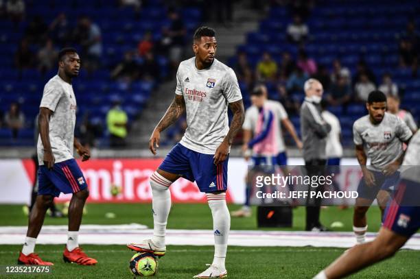 Lyon's German defender Jerome Boateng warms up before the French L1 football match between Olympique Lyonnais and RC Strasbourg Alsace at The...