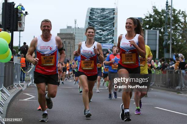 Runners cross the Tyne Bridge during the BUPA Great North Run in Newcastle upon Tyne, England on Sunday 12th September 2021.