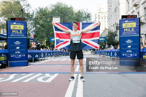 Jake Wightman of Great Britain poses after his win at the New Balance 5th Avenue Mile on September 12, 2021 in New York City.