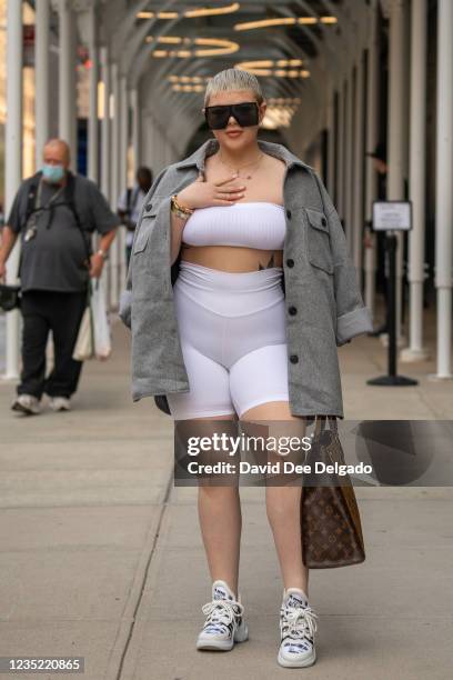 Locklyn is seen wearing a outfit by Fashion nova with a hand bag and shoes by Louis Vuitton at Spring Studios during New York Fashion Week on...