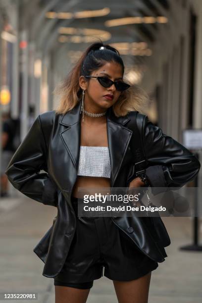 Kryselle Cabral is seen wearing a top and jacket by Kryselle Cabral and shorts by Divided at Spring Studios during New York Fashion Week on September...