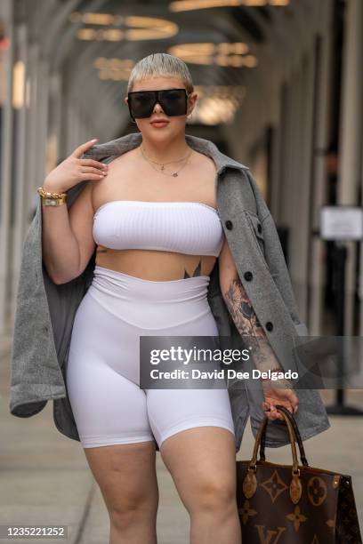 Locklyn is seen wearing a outfit by Fashion nova with a hand bag by Louis Vuitton at Spring Studios during New York Fashion Week on September 12,...