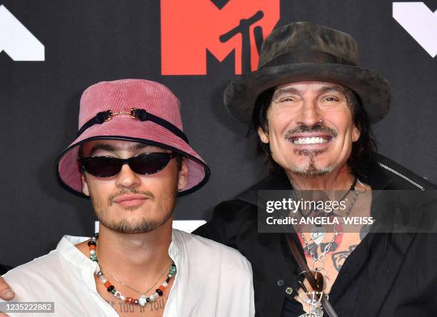 Musician Tommy Lee and his son Brandon Thomas Lee arrive for the 2021 MTV Video Music Awards at Barclays Center in Brooklyn, New York, September 12,...