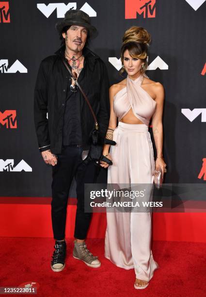 Musician Tommy Lee and Brittany US internet personality Brittany Furlan arrive for the 2021 MTV Video Music Awards at Barclays Center in Brooklyn,...