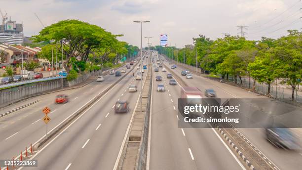 virtual effect of land vehicle movement - kuala lumpur road stock pictures, royalty-free photos & images