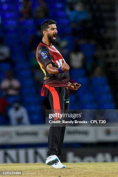 Ali Khan of Trinbago Knight Riders celebrates the dismissal of Joshua de Silva of Saint Kitts & Nevis Patriots during the 2021 Hero Caribbean Premier...