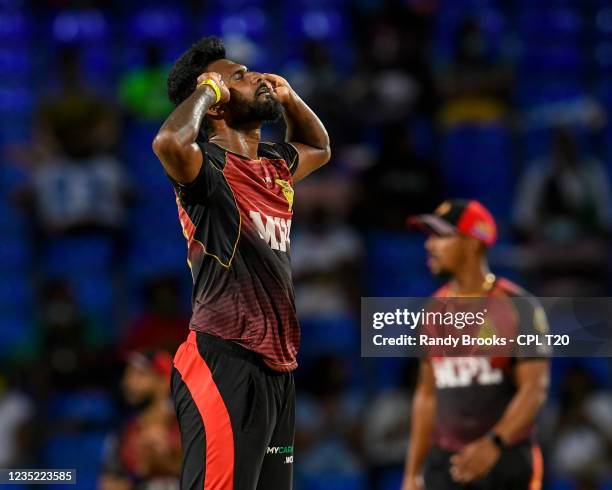 Isuru Udana of Trinbago Knight Riders celebrates the dismissal of Dwayne Bravo of Saint Kitts & Nevis Patriots during the 2021 Hero Caribbean Premier...